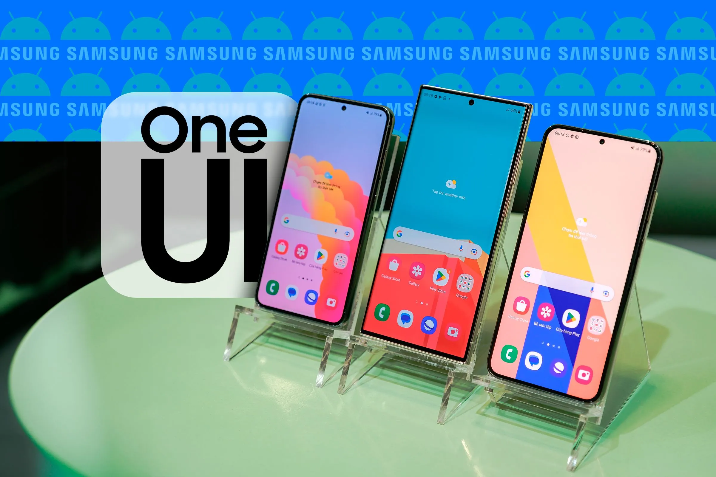 Ba điện thoại Samsung Galaxy với giao diện One UI 7, logo Samsung và Android