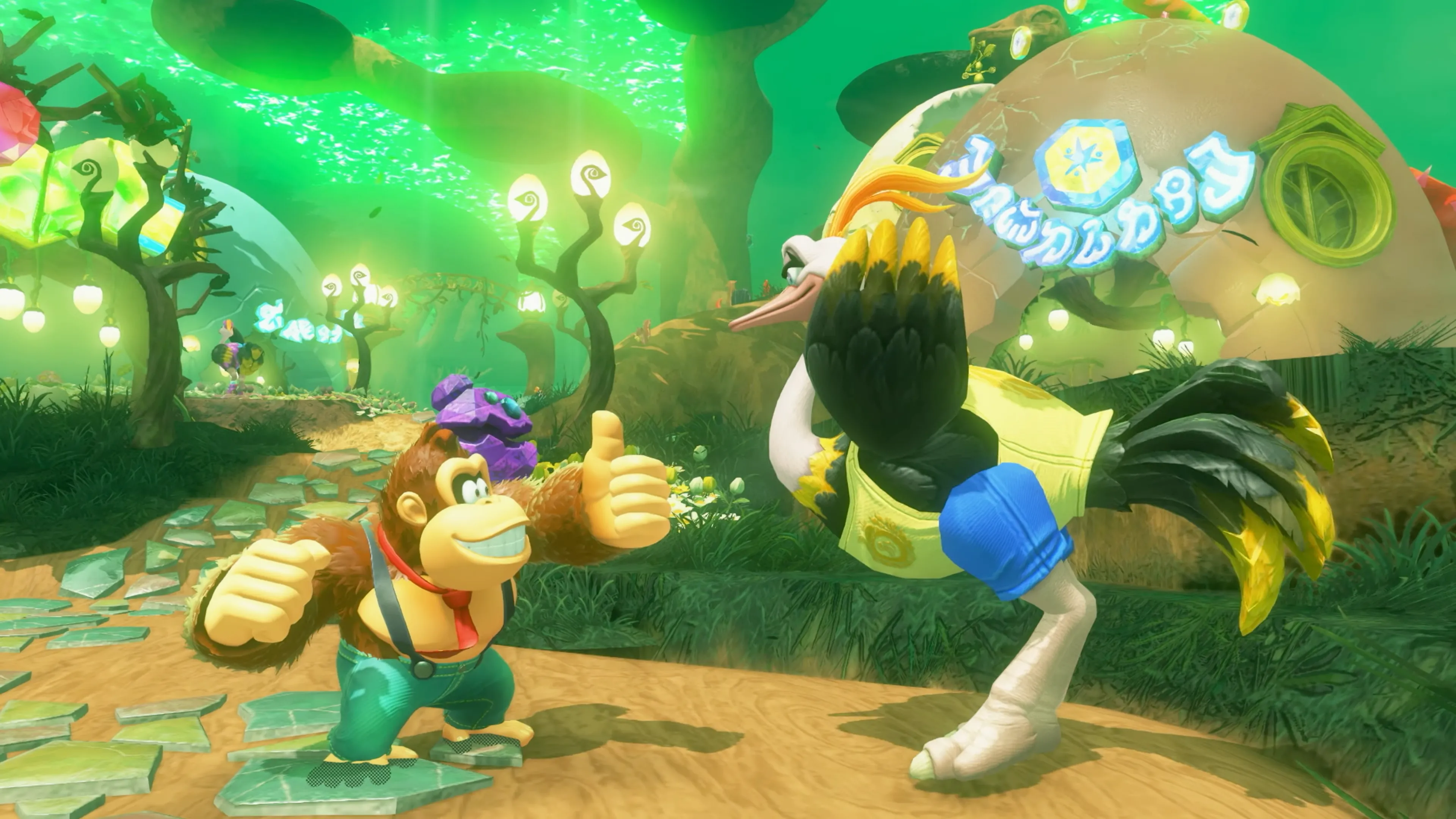 Donkey Kong Bananza: Donkey Kong giơ ngón cái chào đà điểu trong cảnh game.
