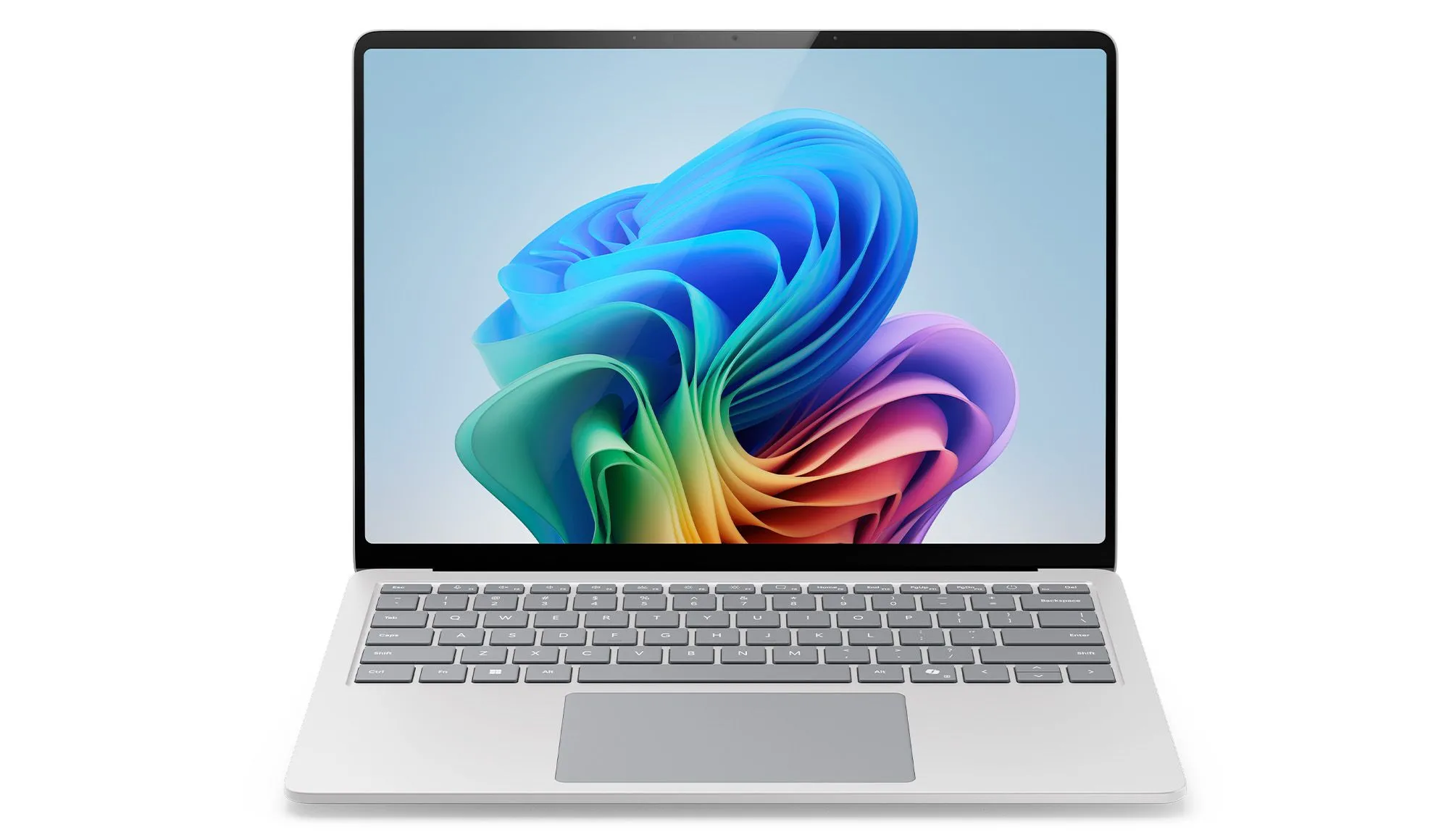 Laptop Microsoft Surface màu bạc nhìn từ góc cạnh với màn hình sáng