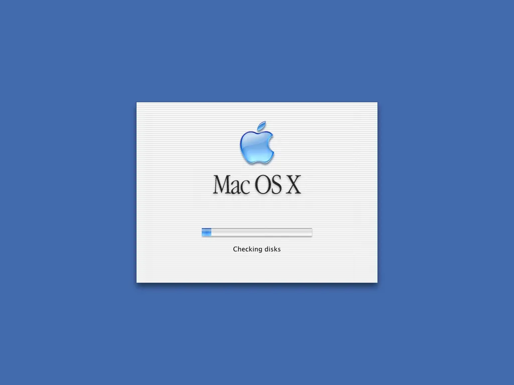 Màn hình khởi động hệ điều hành Mac OS X với giao diện Aqua đặc trưng