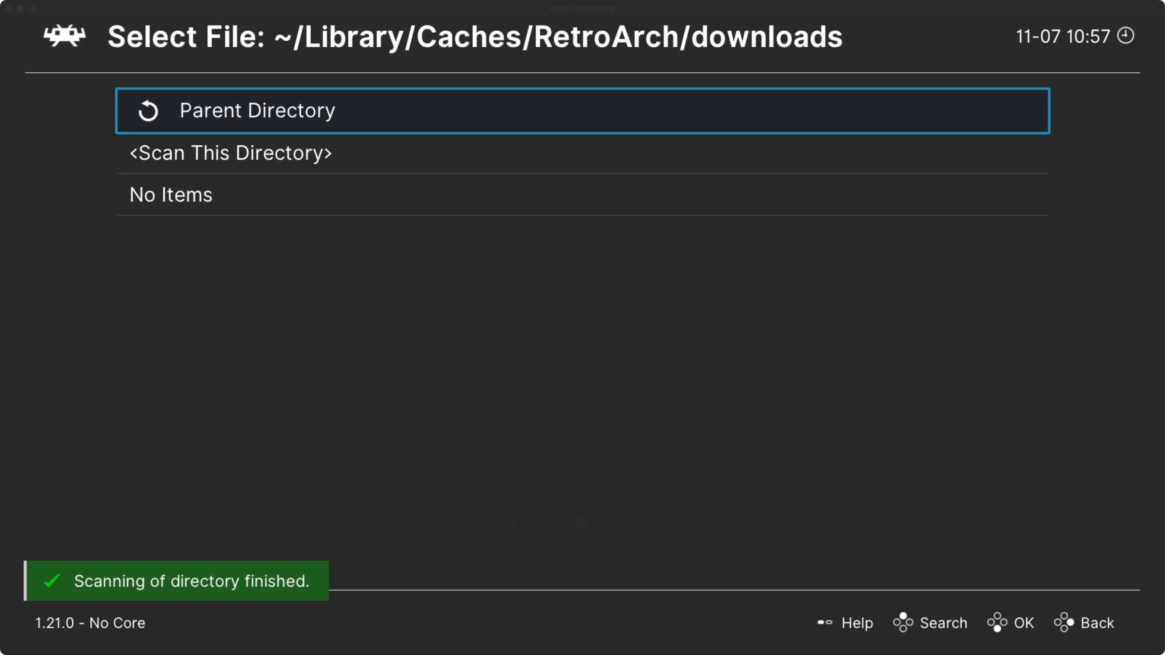 Màn hình ứng dụng RetroArch trên Apple TV hiển thị quá trình quét thư mục để tìm và thêm nội dung game mới
