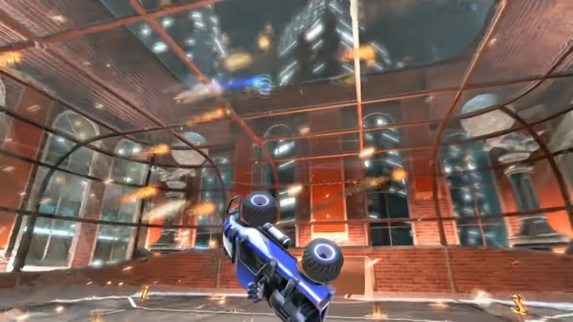 Một chiếc xe bay lơ lửng trên không trung khi tham gia trận đấu xe đá bóng trong Supersonic Acrobatic Rocket-Powered Battle-Cars.