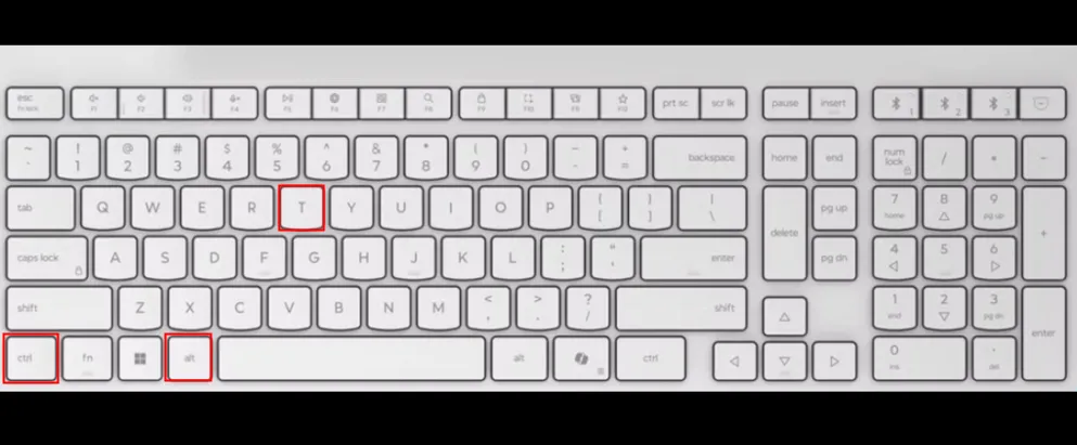 Bàn phím trắng với các phím Ctrl, Alt và T được đánh dấu đỏ, minh họa phím tắt mở Terminal Ubuntu.