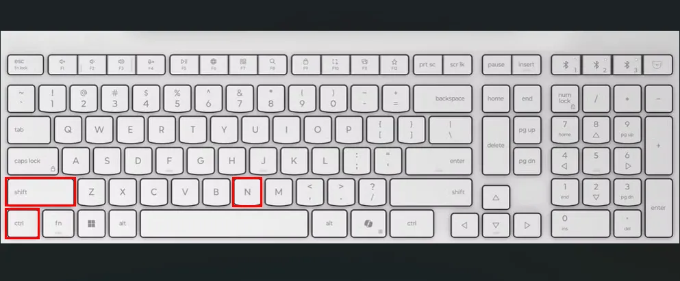 Bàn phím với các phím Ctrl, Shift và N được đánh dấu đỏ, minh họa phím tắt tạo thư mục mới trong giao diện Ubuntu.