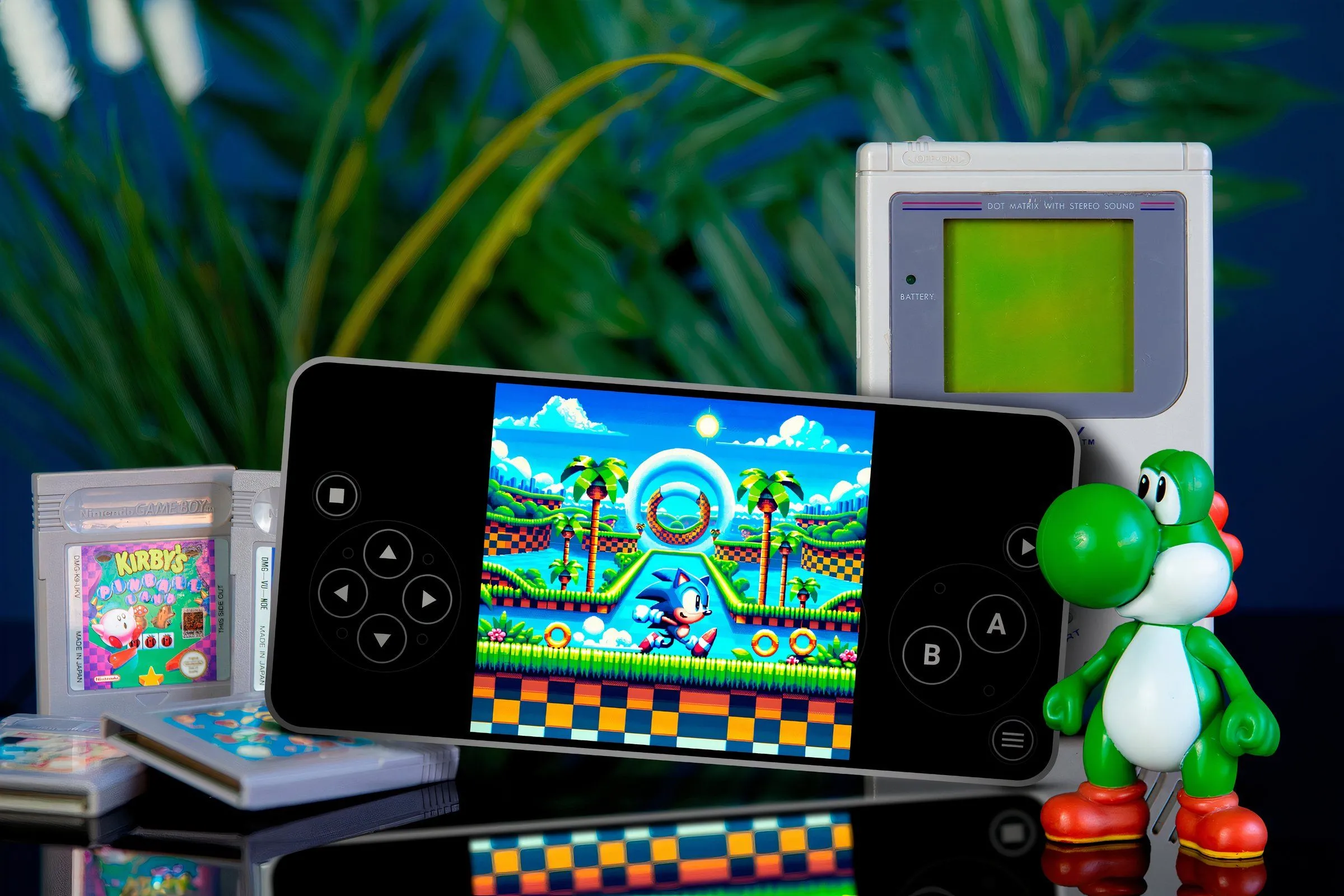 Điện thoại đang chạy game Sonic trên trình giả lập, xung quanh là băng game và máy Game Boy