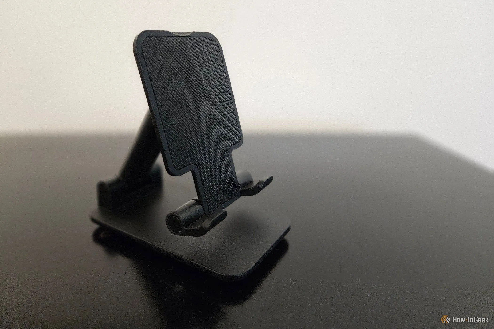 Giá đỡ điện thoại di động tiện lợi, có thể gập gọn, hỗ trợ sử dụng iPhone khi đi du lịch