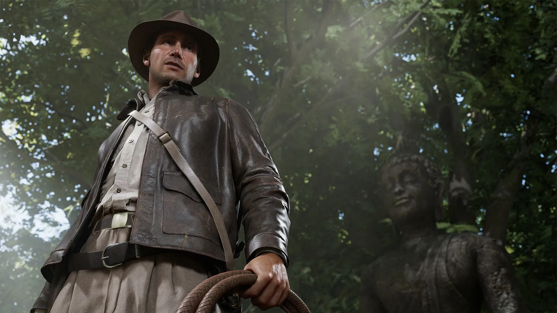 Hình ảnh quảng bá game Indiana Jones và Vòng Tròn Lớn, cho thấy Indiana Jones đối mặt với nguy hiểm trong một khung cảnh hang động cổ đại đầy bí ẩn