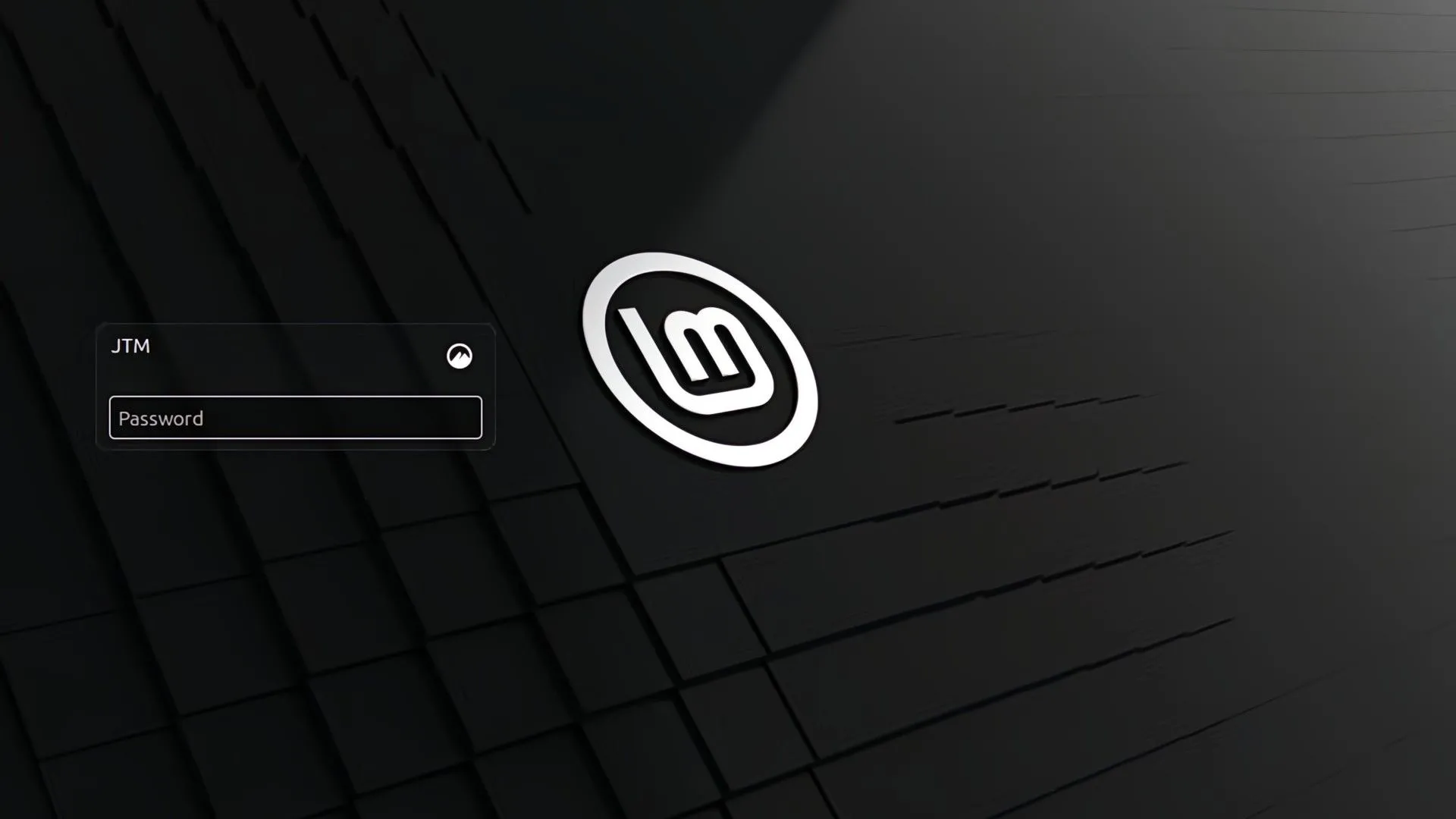 Màn hình đăng nhập ban đầu của Linux Mint Cinnamon, thể hiện giao diện thân thiện cho người mới