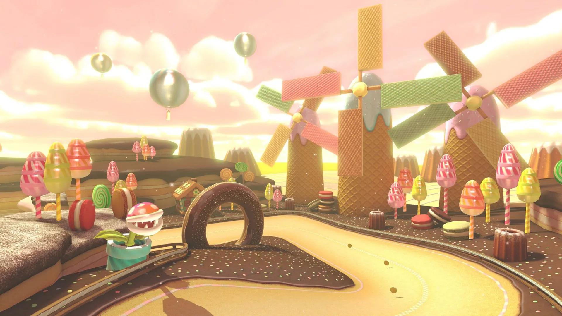 Màn hình giới thiệu đường đua Sweet Sweet Canyon trong Mario Kart 8 Deluxe, ngập tràn kẹo ngọt.