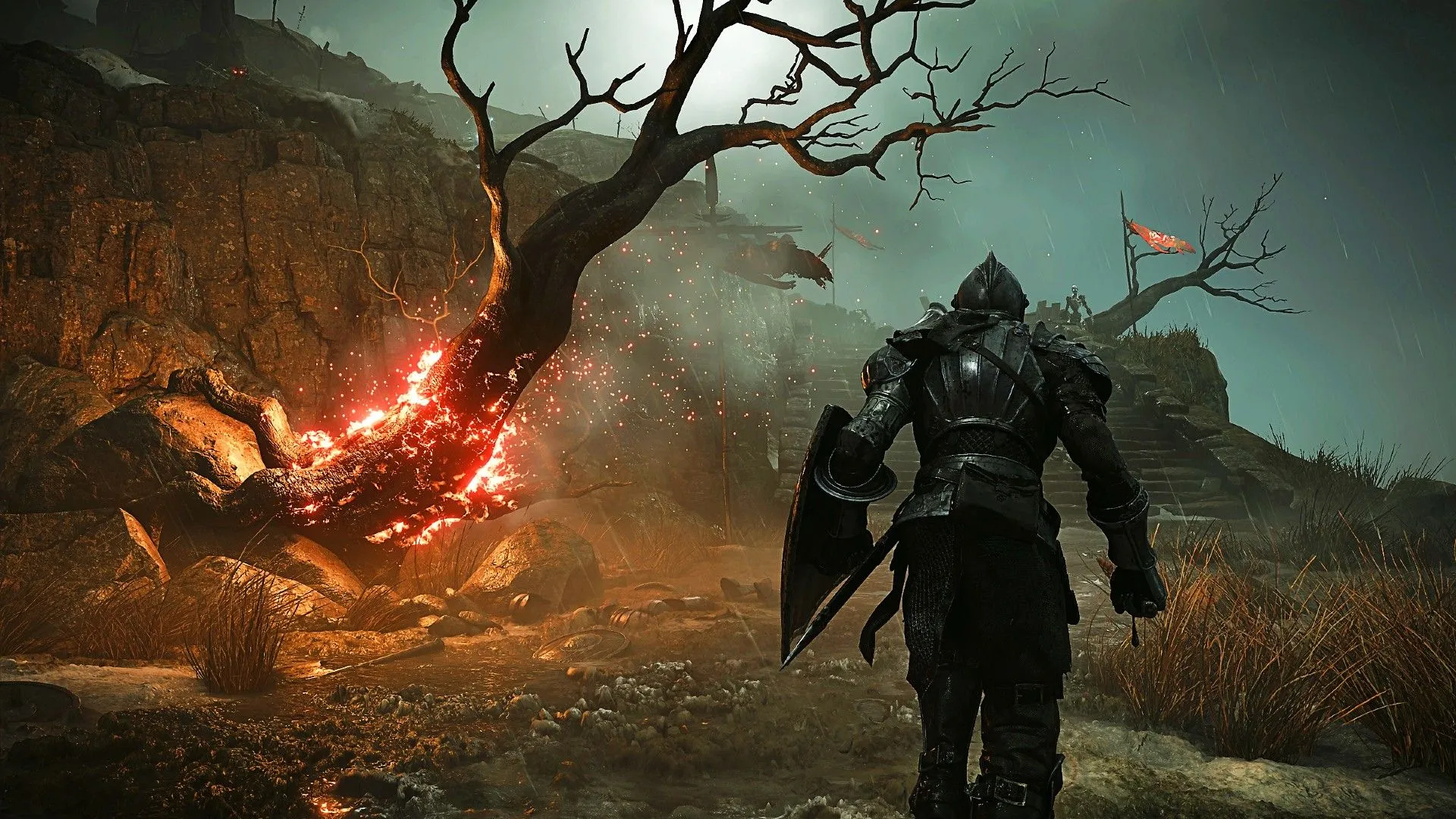 Màn hình Shrine of Storms trong Demon's Souls Remake với người chơi và cây cháy