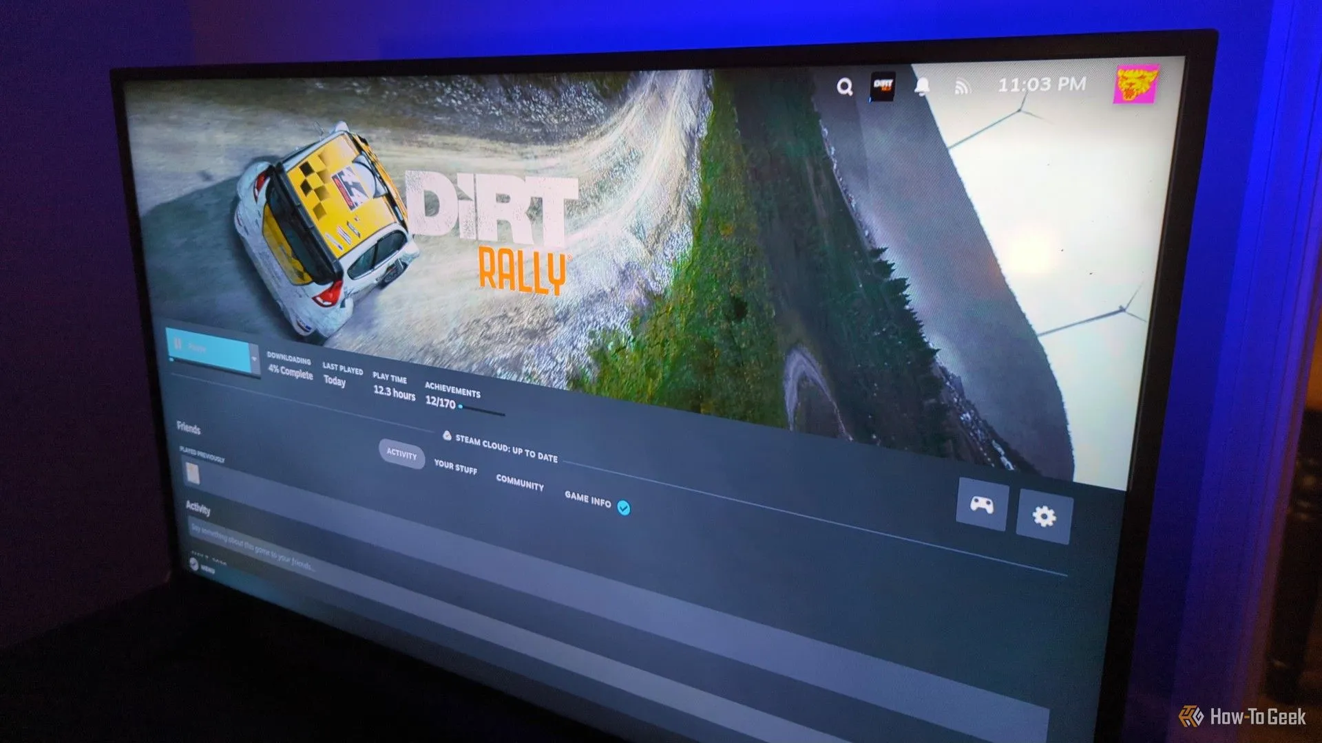 Màn hình Steam trên TV đang cài đặt game Dirt Rally.