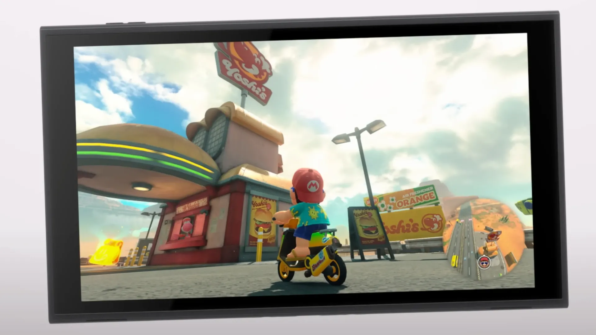 Màn hình Switch 2 hiển thị game Mario với nhân vật Mario trên xe scooter
