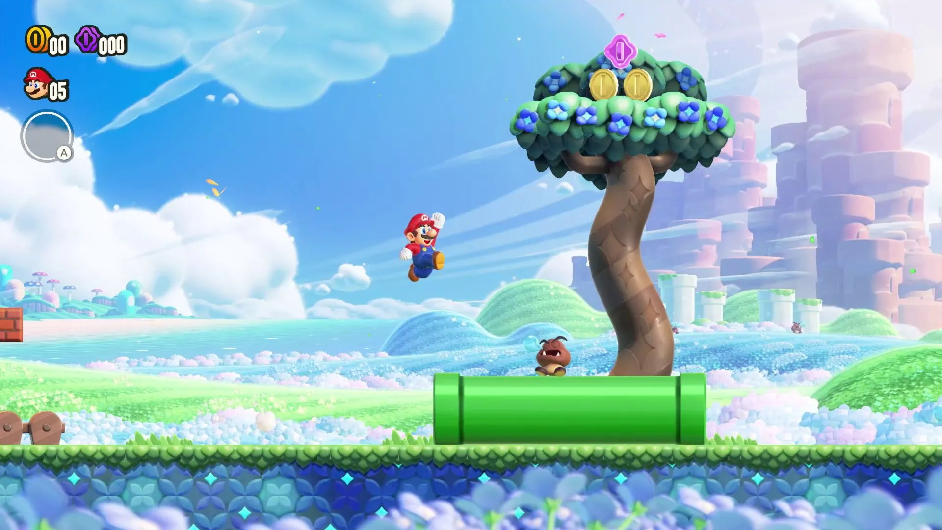Một cảnh chơi game Super Mario Bros. Wonder, thể hiện rõ phong cách 2.5D với đồ họa 3D nhưng giới hạn chuyển động trên mặt phẳng 2D.
