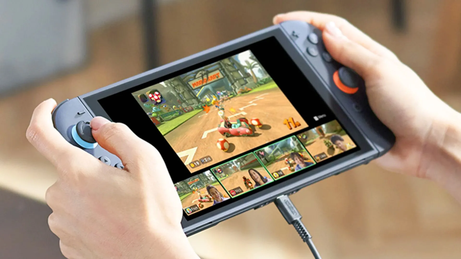 Người dùng đang chơi Nintendo Switch 2 ở chế độ cầm tay