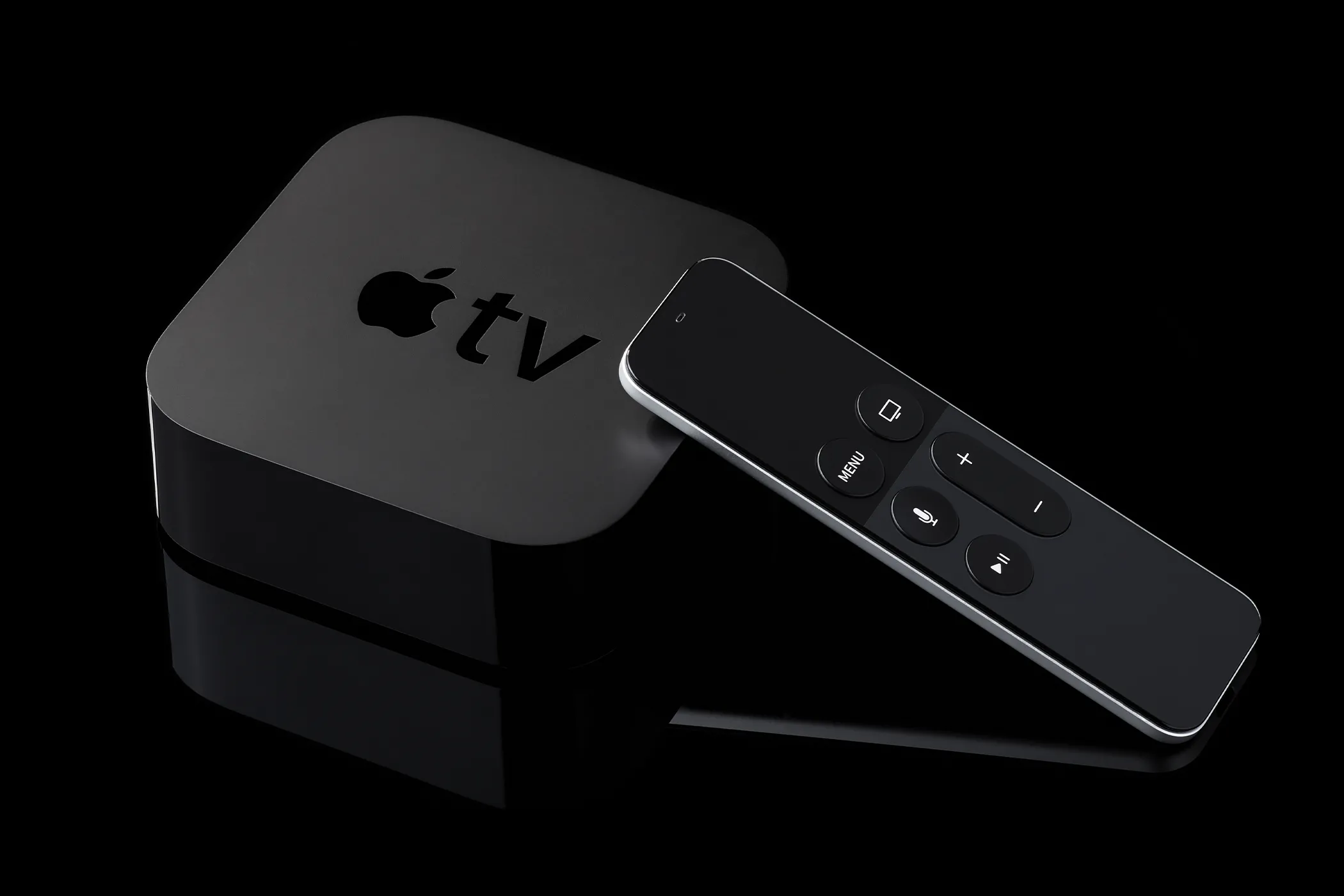 Thiết bị Apple TV 4K màu đen trên nền tối, đại diện cho thiết bị giải trí gia đình và tiềm năng chơi game