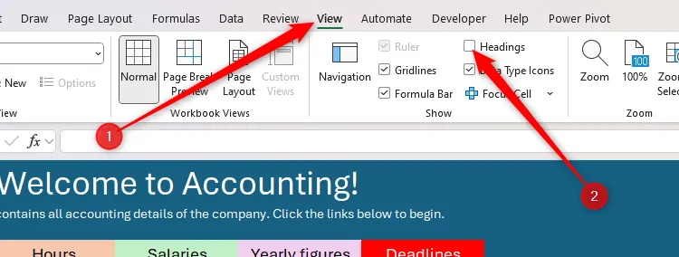 Tùy chọn &quot;Headings&quot; được bỏ chọn trong tab &quot;View&quot; của Excel để ẩn tiêu đề cột và hàng.