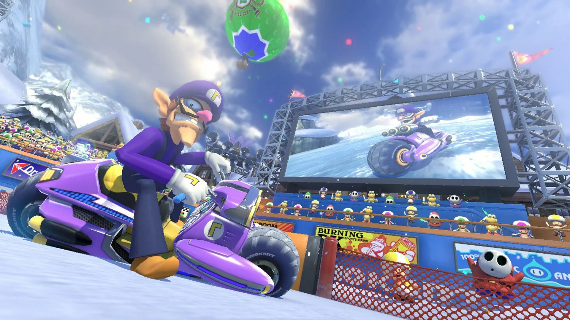 Waluigi về đích trên đường đua Mount Wario trong Mario Kart 8 Deluxe, với phong cảnh núi tuyết hùng vĩ.